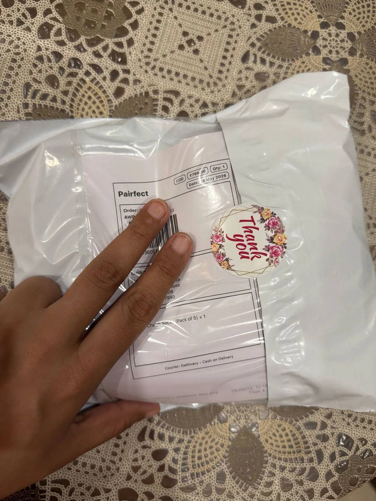 Daisy Charm socks delivery photo by Simran